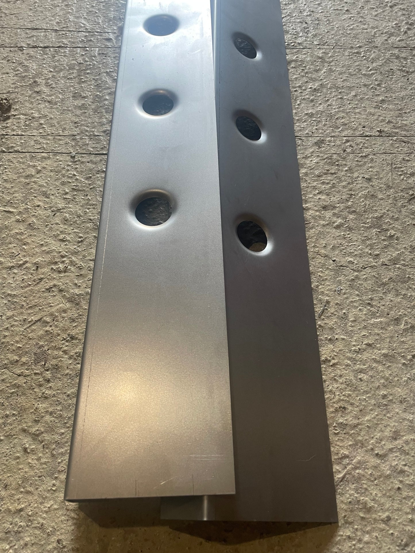 Pair of Side Skirts - swaged holes